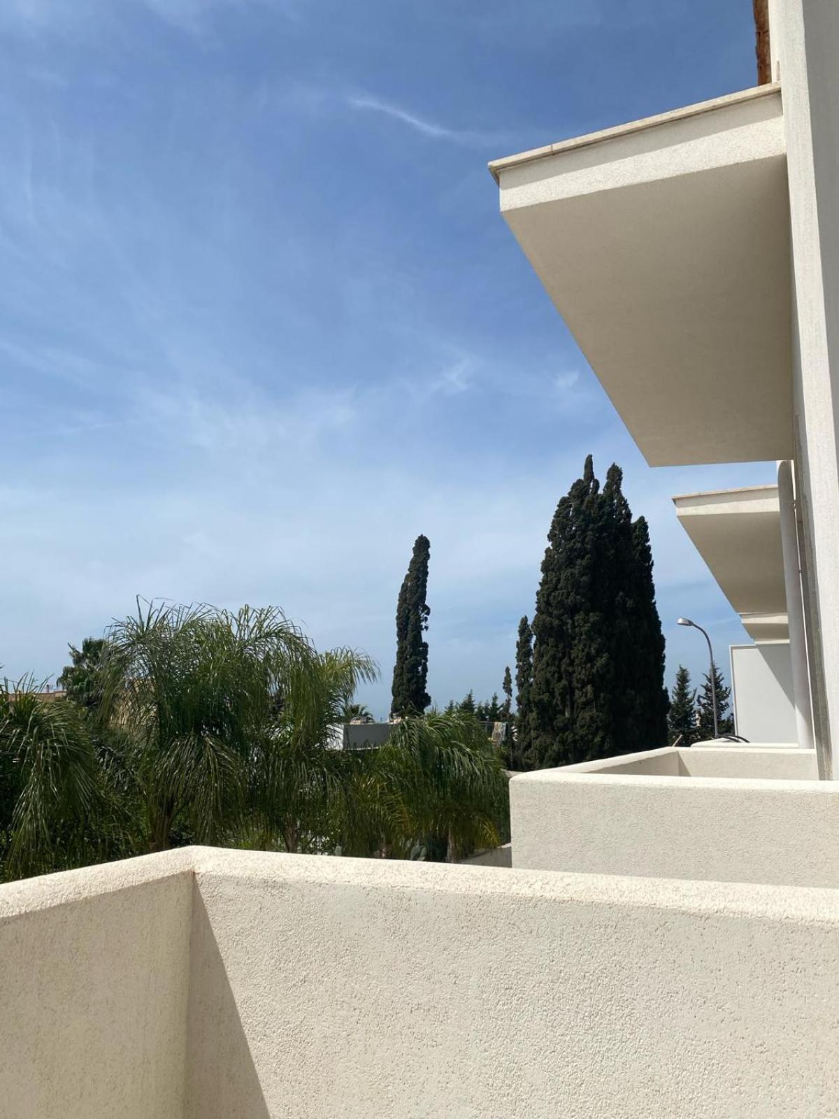 Sole, Mare E Trallalla Rilievo Buitenkant foto